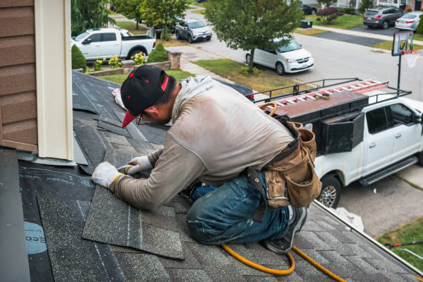 Professional Roofing technician working in Woodburn, OR